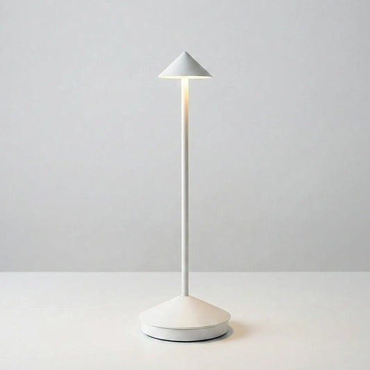 Modern white desk lamp on a light gray background